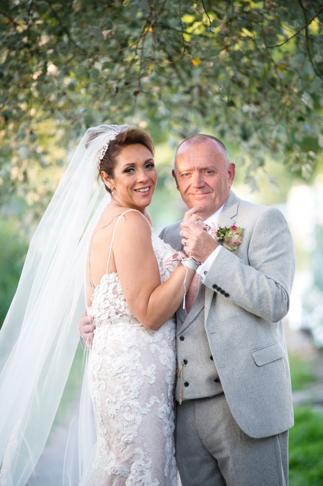 Bride and groom  on the grounds of Lyme Breeze wedding venue Maclesfield