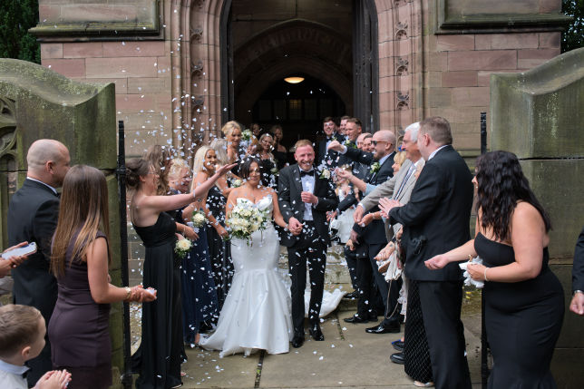 The bride and groom is confetti run at St George's Church, London Road, Stockport
